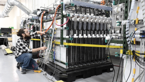 An electrical engineer works on Form Energy's 2022 battery module in the company's lab in Berkeley, California. Image courtesy of Form Energy